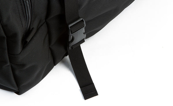 An close shot of the lash strap buckle on the Road Buddy Duffel 60.